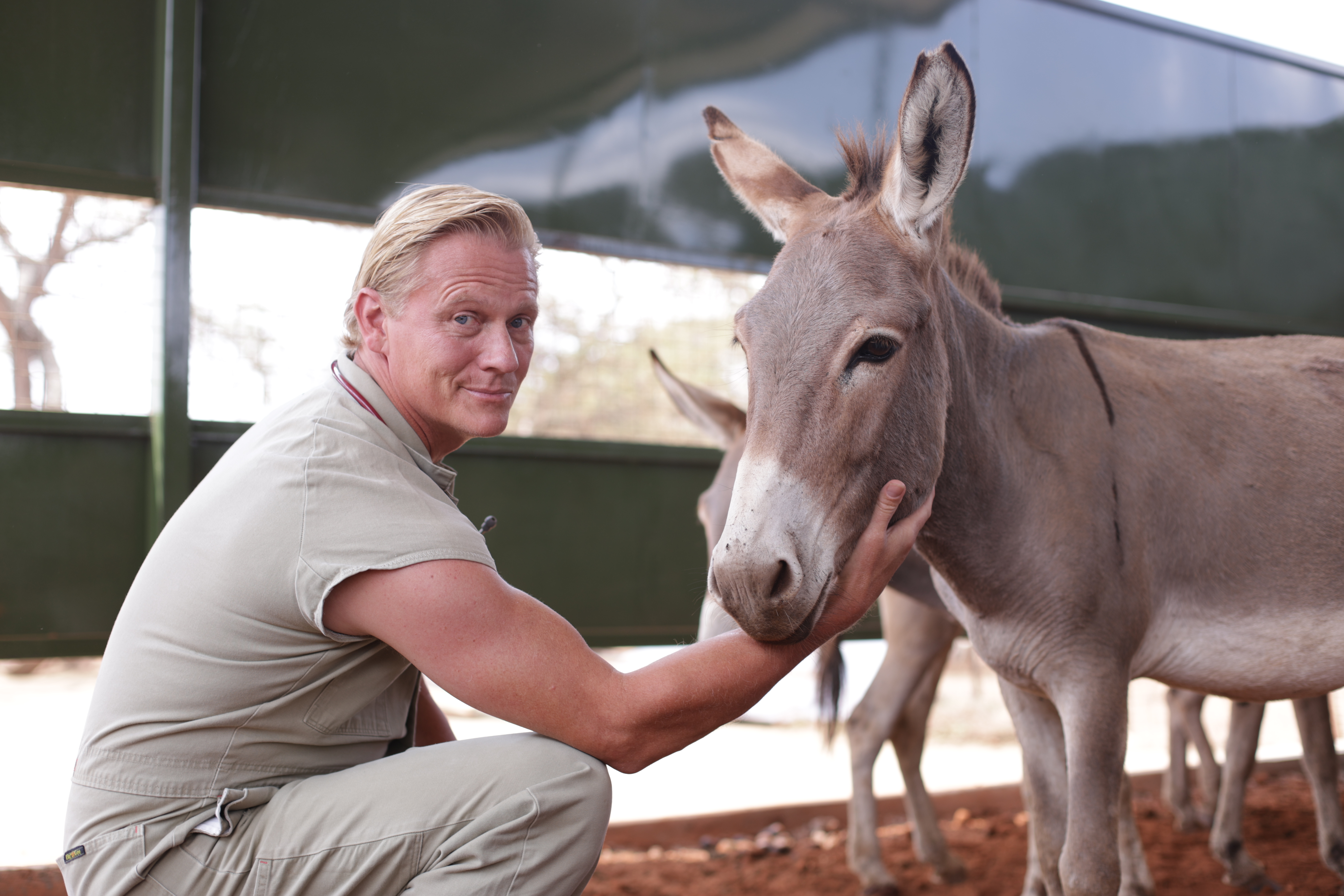 Dr Scott Miller with a donkey in Kenya