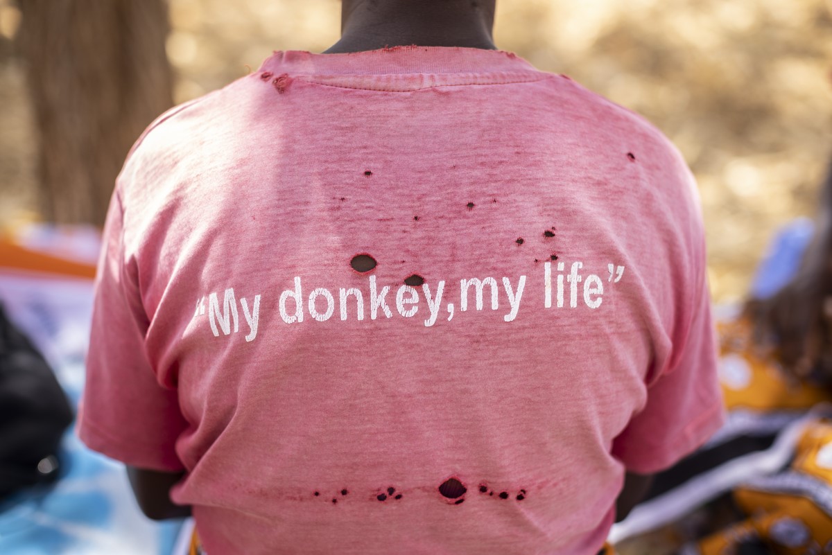 Back of a pink T-shirt reading 'My donkey, my life' in Kenya