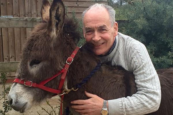 Alastair Stewart with one of his donkeys, Hobnob Alastair Stewart with one of his donkeys, Hobnob