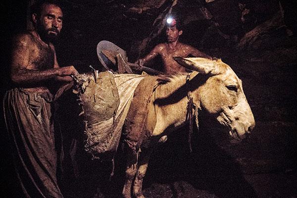 Working in the mine Working in the mine