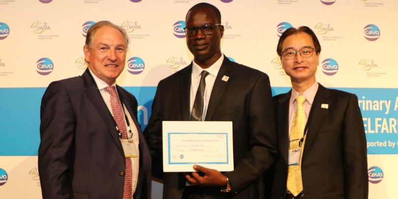 Dr Seck holding his World Veterinary Animal Welfare Award Dr Seck holding his World Veterinary Animal Welfare Award
