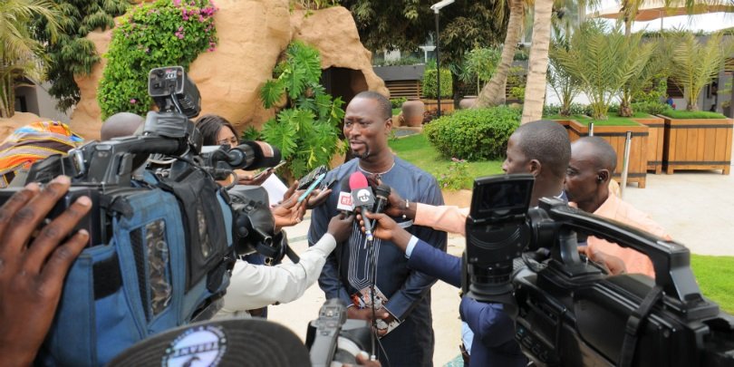 Brooke's Emmanuel Sarr surrounded by reporters Brooke's Emmanuel Sarr surrounded by reporters