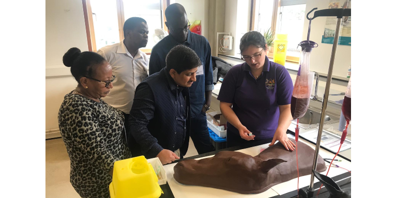 Amy demonstrating how to teach blood sampling with a model at the RVC Clinical Skills lab, who kindly hosted Brooke in 2019. Dr Amy Barstow