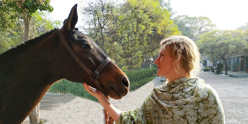 Jen with an equine friend in Pakistan
