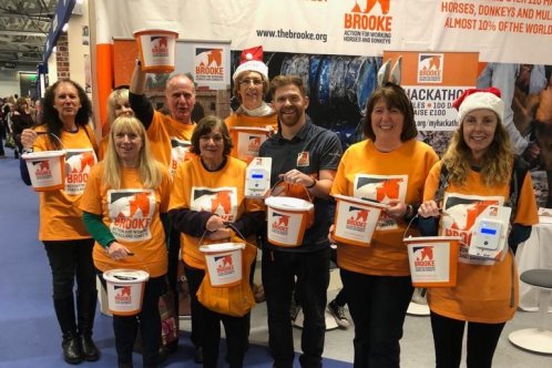 Brooke fundraisers with collection tins Brooke fundraisers with collection tins