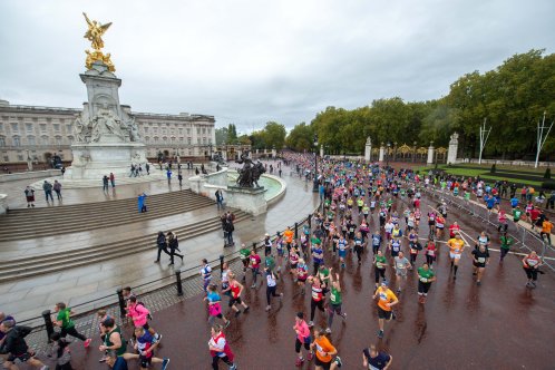 royal parks half marathon runners crossing westminster bridge