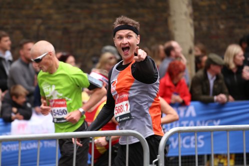 Marathon runner pointing at camera