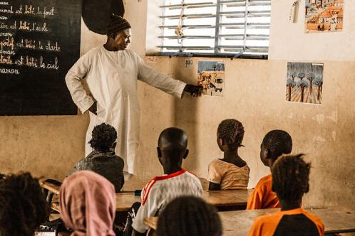 A teacher explains about looking after animals