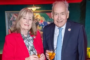 Alastair Stewart (right) stands next to wife, Sally