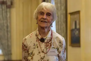 Ann Searight, Brooke Vice-President, stands with her hands behind her back