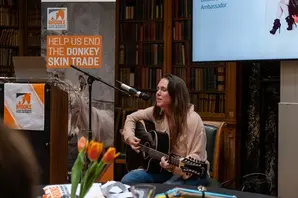 Singer Sandi Thom with her guitar at a Brooke supporter event