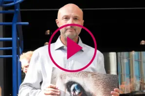Brooke CEO Chris Wainwright outside Amazon UK HQ with a donkey skin trade banner 