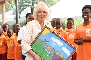 Queen Camilla meets students from a Donkey Care Club. Photo credit Samir Hussein/WireImage