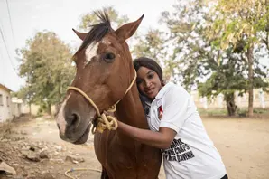 Farrier and horse in Senegal