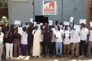 Students celebrate as they graduate with a government-accredited certification in farriery.