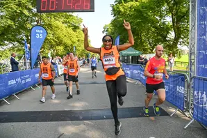 A person crossing a finish line in a race