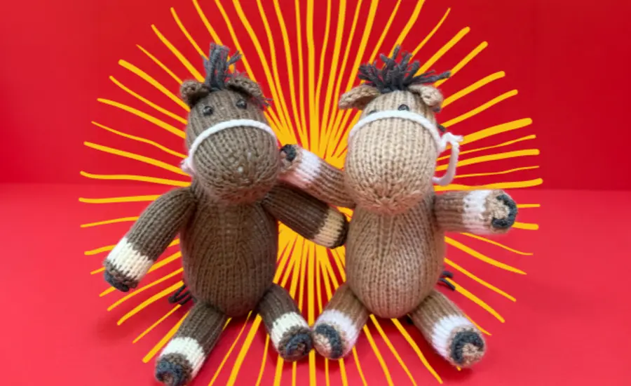two knitted horses from Brooke's year of the horse craft pack
