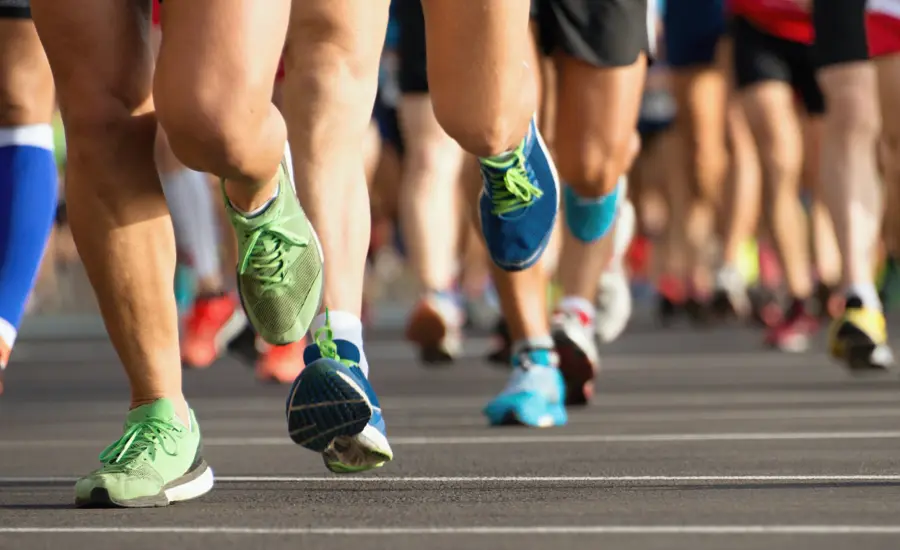 Landscape shot of people's legs running