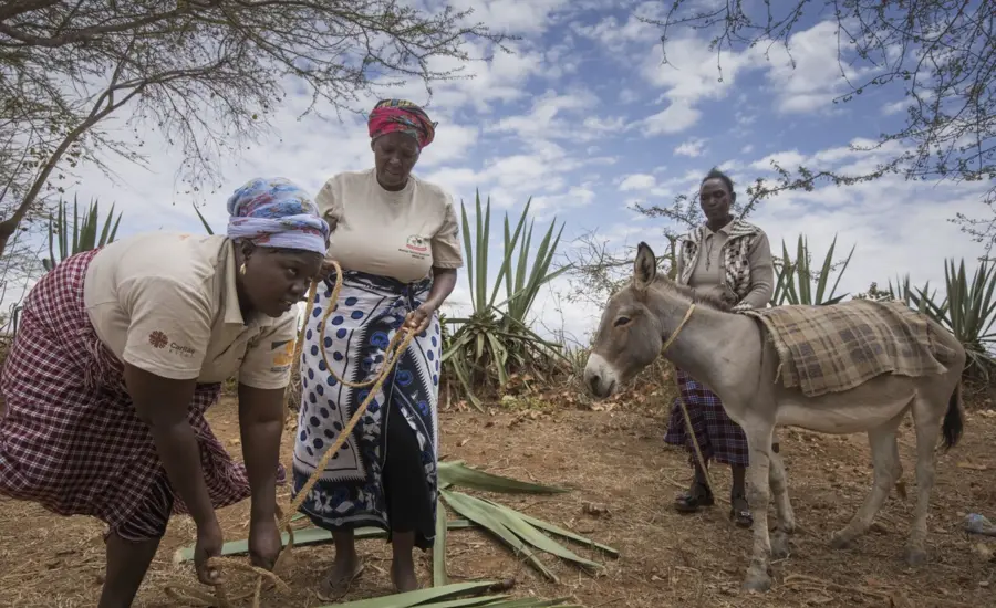 Women with donkey in Kenya
