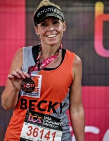 Rebecca with her medal from the 2022 London Marathon.  Rebecca with her medal from the 2022 London Marathon.