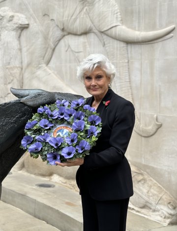 Angela Rippon with Brooke's wreath at the 2024 memorial service Angela Rippon holding wreath at London memorial service