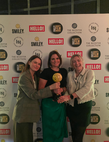 Brooke staff at the Smiley Charity Film Awards 2025 Brooke staff holding trophy at the Smiley Charity Film Awards 2025