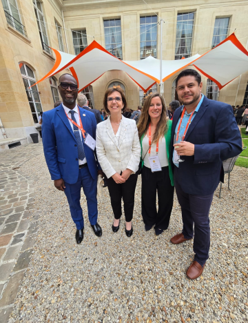 Brooke staff with Director of the World Organisation for Animal Health (centre left) at WOAH 2025. Brooke staff and partners attend World Organisation for Animal Health's 92nd General Session, Paris, 2025.