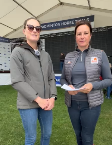 Eventer Caroline Harris with Brooke representative at Badminton Horse Trials 2025.