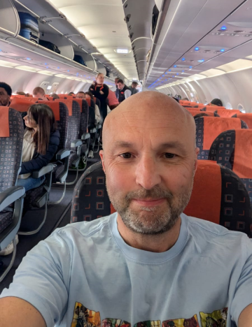 Brooke's CEO, Chris Wainwright, en route to WOAH 2025. Brooke CEO, Chris Wainwright, on the plane to an event in Paris, 2025.