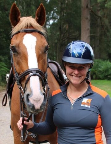 British Olympic rider Gemma Stevens Gemma Stevens with horse wearing Brooke branded top.
