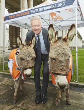 Rory Bremner at Brooke's 2019 carol service Rory Bremner with donkeys at charity carol service