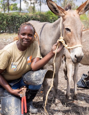 Jane, a farrier, with donkey