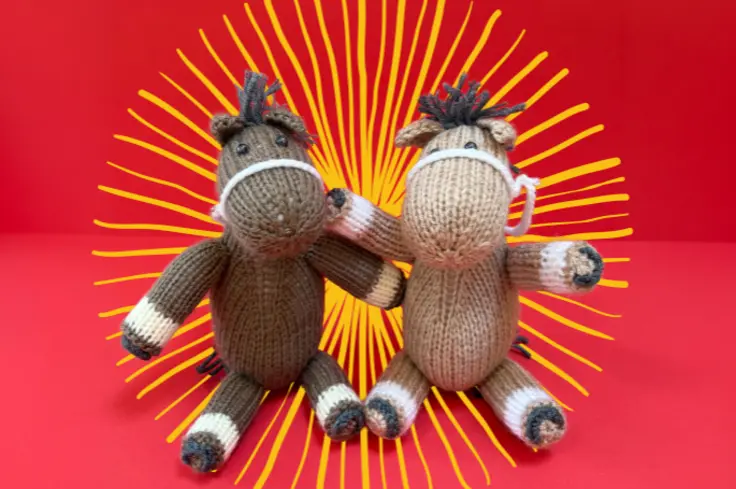 two knitted horses from Brooke's year of the horse craft pack