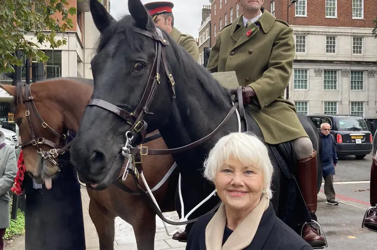 Annette with cavalry soldiers and horses 