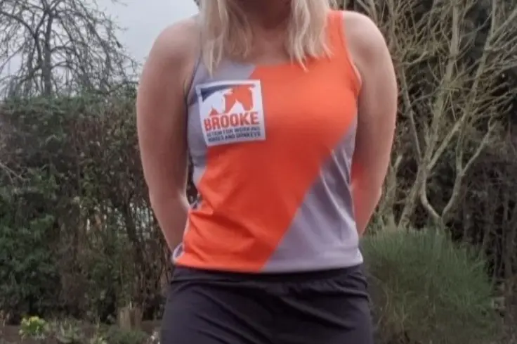 Sylv wears the Brooke vest ahead of this year's London Marathon.