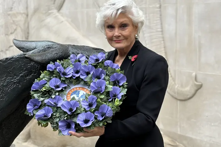 Angela Rippon holding wreath at London memorial service