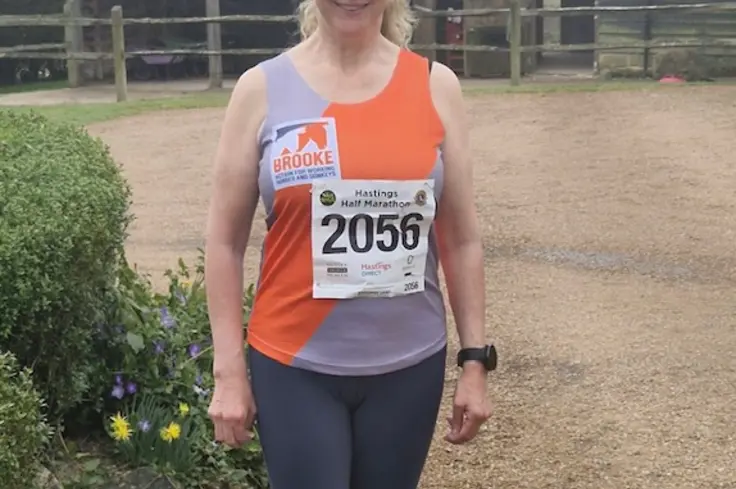 Jenny Lee wearing Brooke vest to run half marathon.