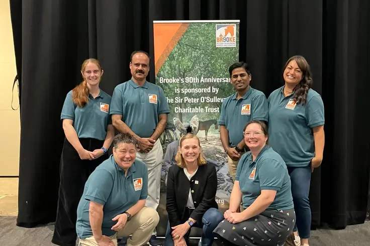 Brooke's team by banner at vet congress in Liverpool 